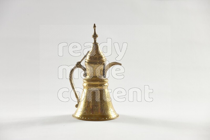 A metal turkish pot for coffee on white background