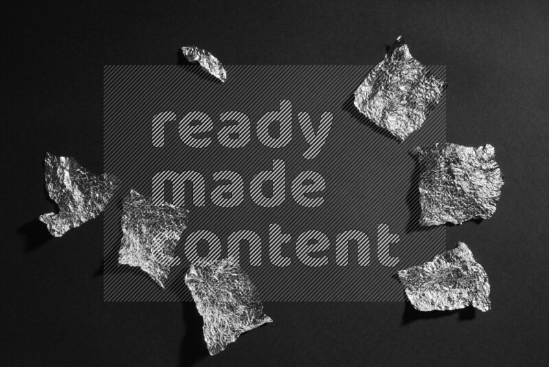 Aluminium foil on black background
