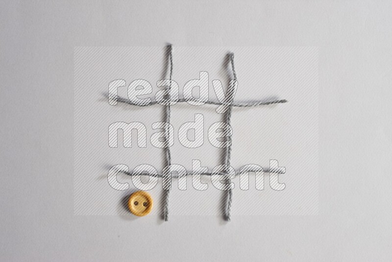 Wooden buttons placed on grey background