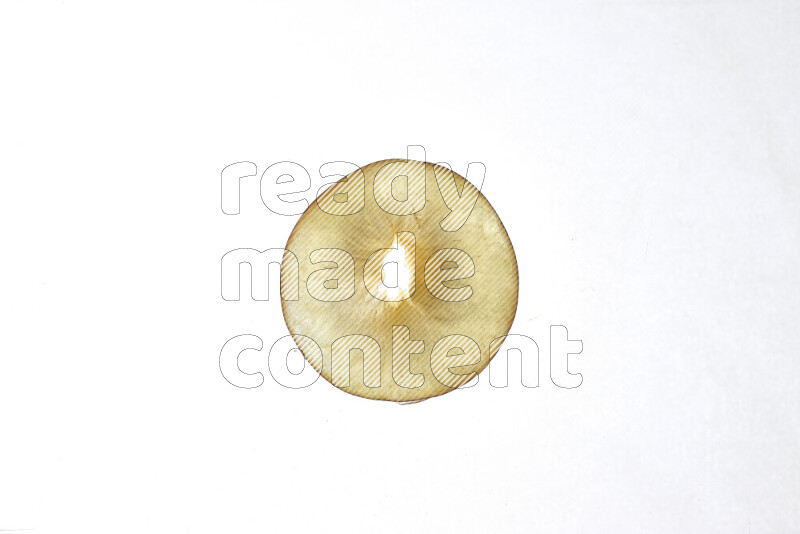 Peach slices on illuminated white background