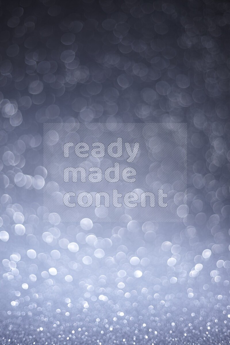 Silver glittery bokeh background