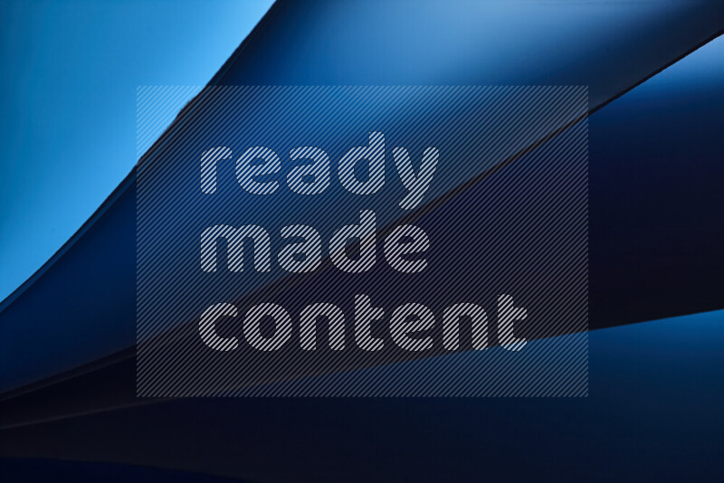 An abstract art piece displaying smooth curves in cold gradients created by colored light