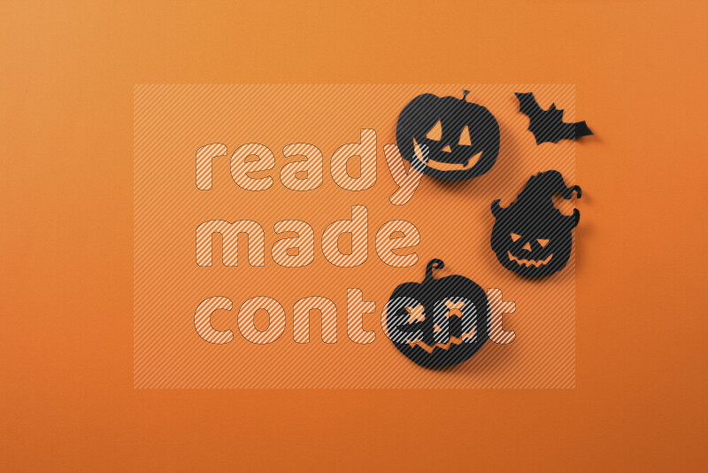Halloween hand crafts on orange background