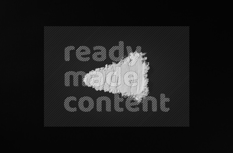 White powder smears on black background