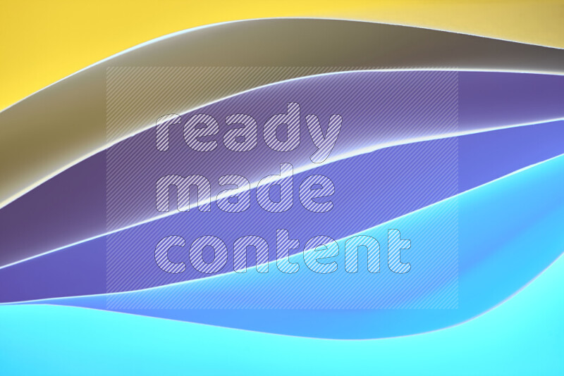 This image showcases an abstract paper art composition with paper curves in blue and yellow gradients created by colored light
