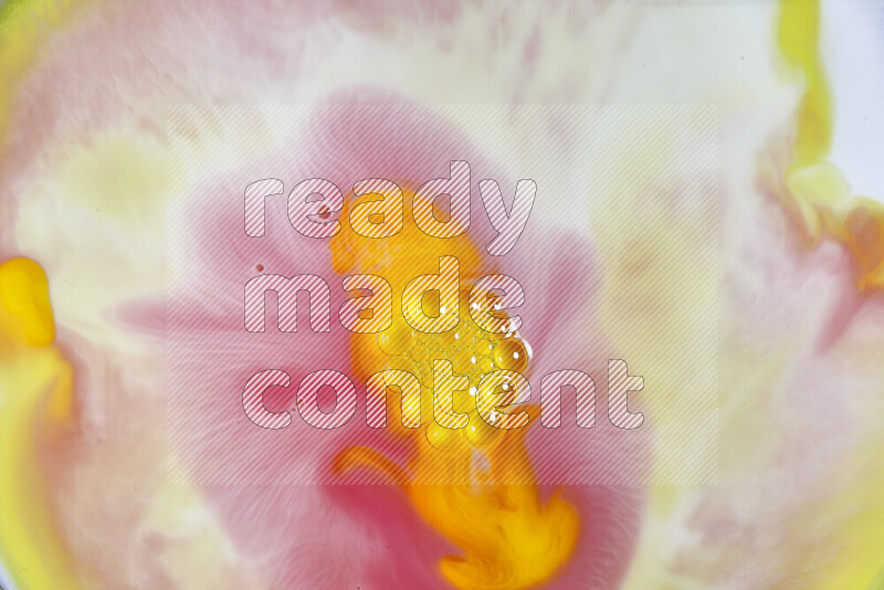 A close-up of abstract swirling patterns in orange, red and white