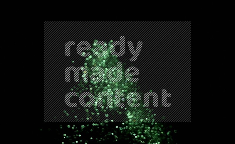 Green glitter powder isolated on black background