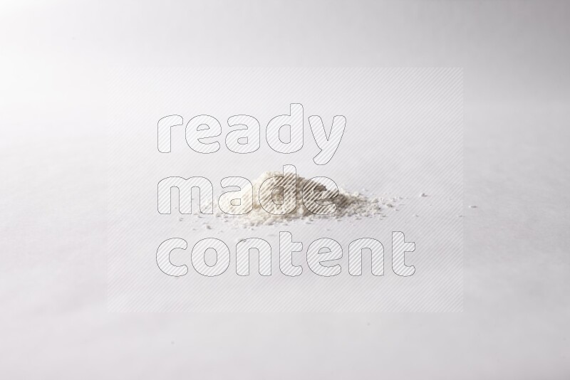Desiccated coconuts on white background
