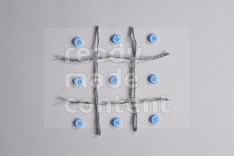 Blue buttons placed on grey background