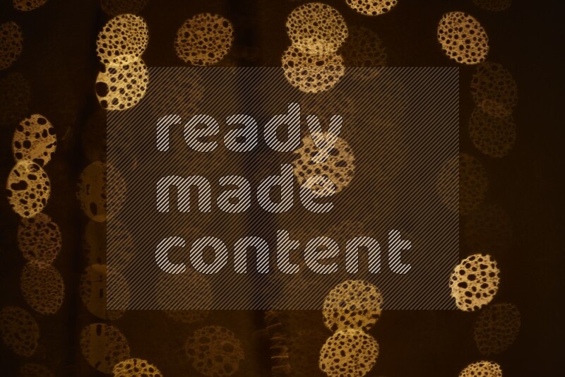 Bokeh light in yellow with water drops