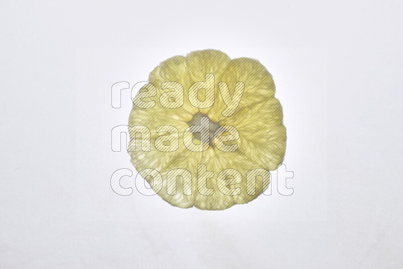 Orange slices on illuminated white background