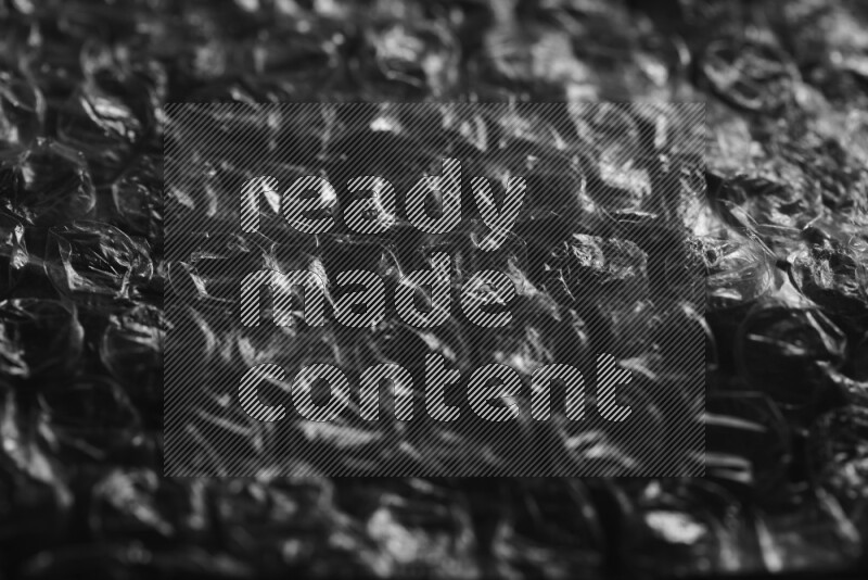 Bubble wrap texture on black background