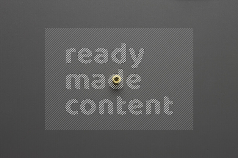 Small rings pasta on grey background