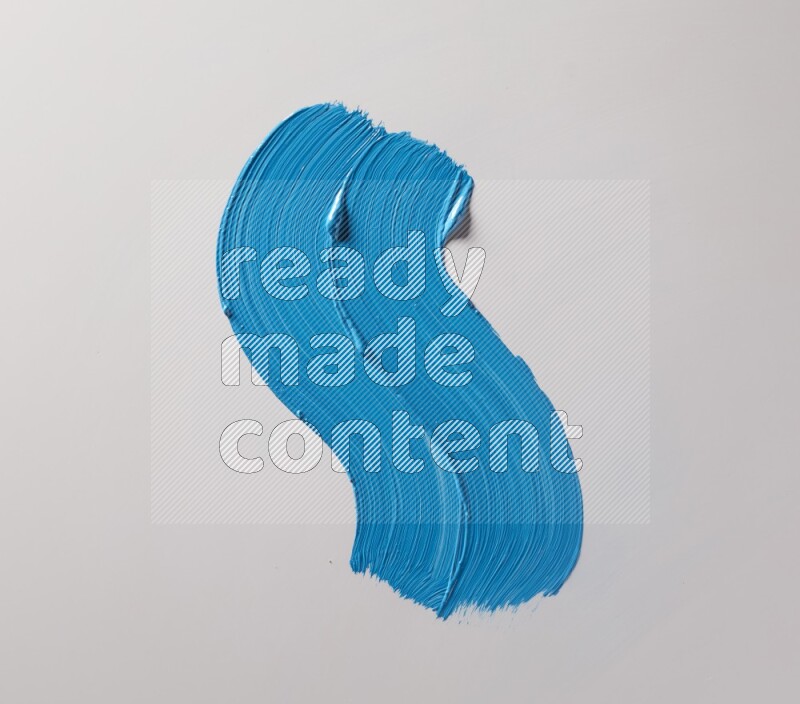 Multi blue curved brush strokes shaped into different shapes on a white background