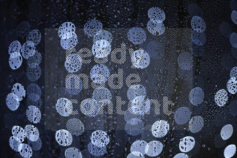 Bokeh light in white with water drops