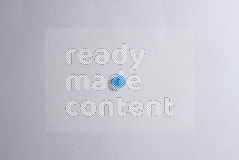 One colored button on grey background