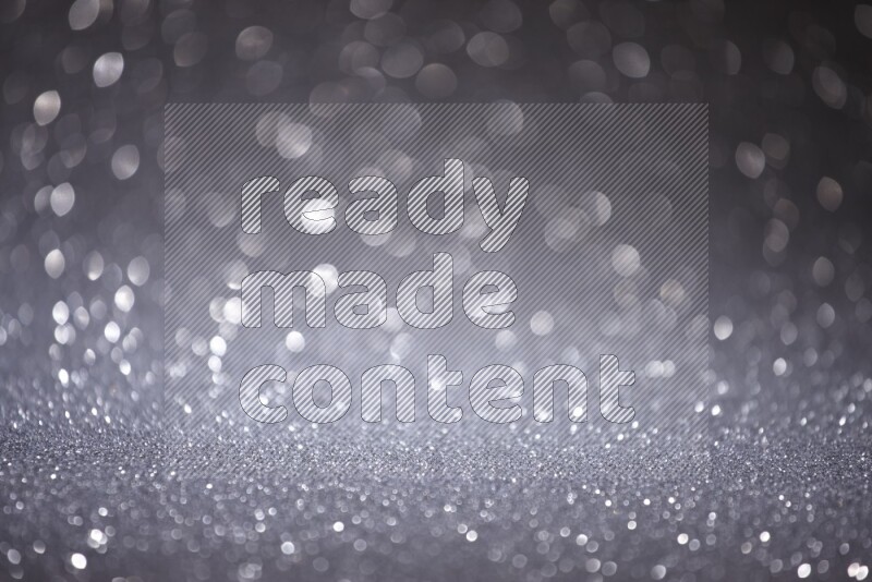 Black glittery bokeh background