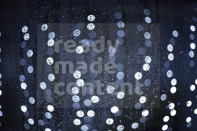 Bokeh light in white with water drops
