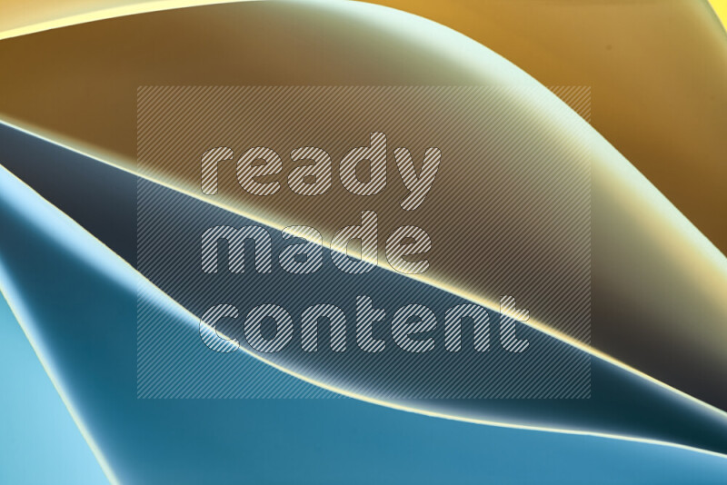 This image showcases an abstract paper art composition with paper curves in blue and yellow gradients created by colored light