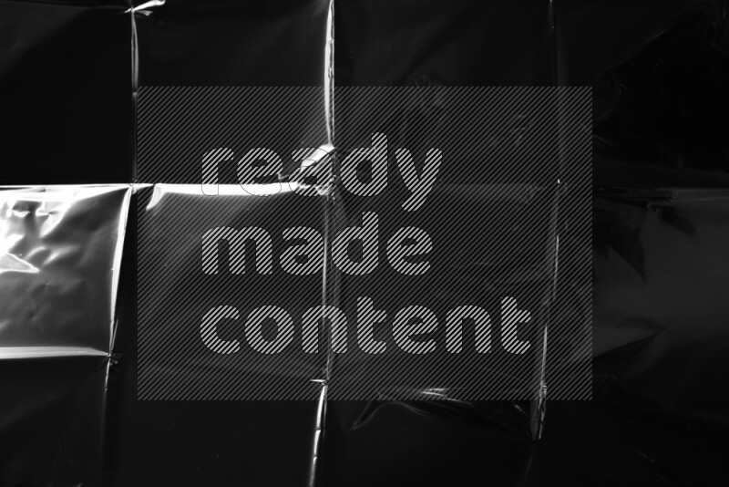 Plastic wrap texture on black background
