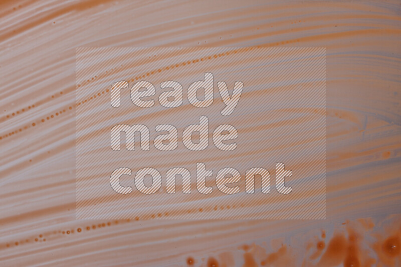 Close-ups of abstract orange paint texture in different shapes