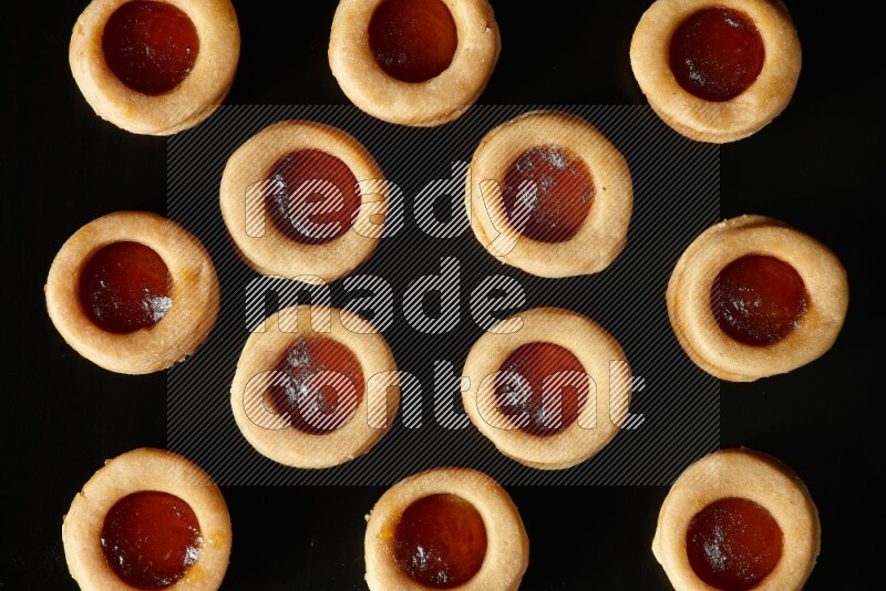 Jam cookies on a black background