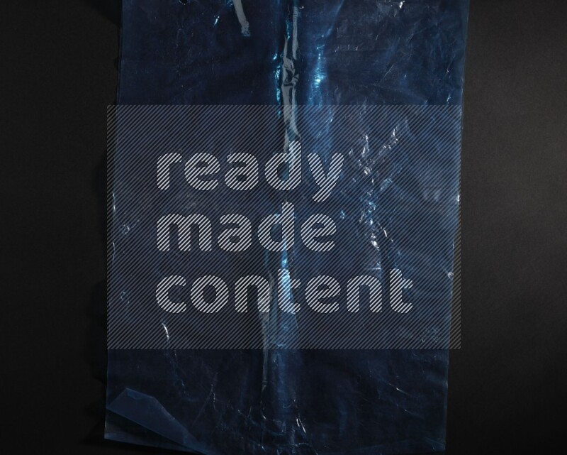 Colored plastic textures on black background