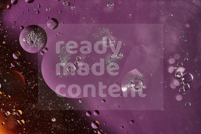 Close-ups of abstract oil bubbles on water surface in shades of orange and purple