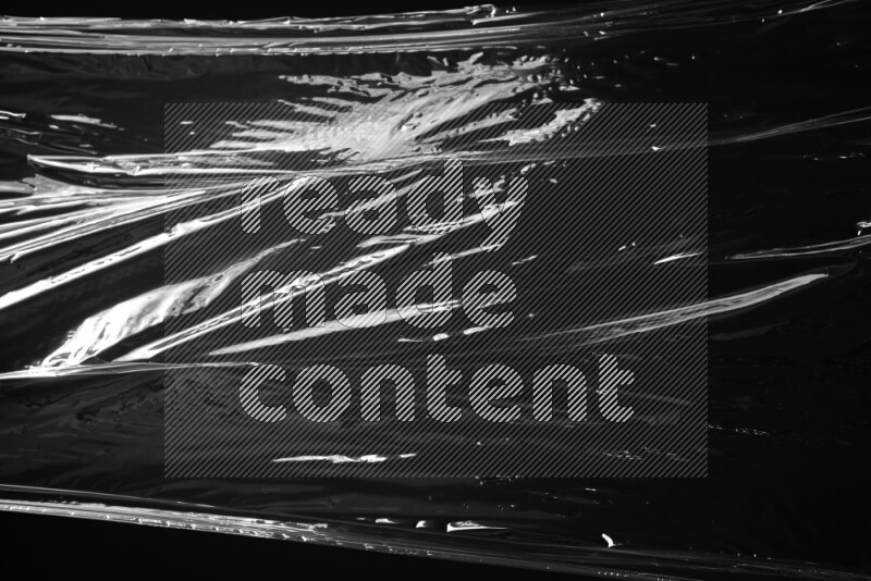 Plastic wrap texture on black background