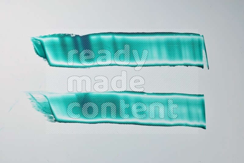 Turquoise painting knife strokes on white background