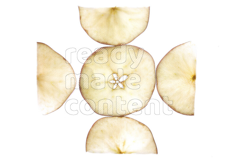 Apple slices on illuminated white background