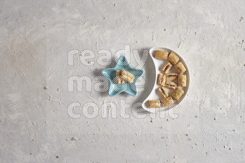 Oriental sweets in a pottery plate in a light setup