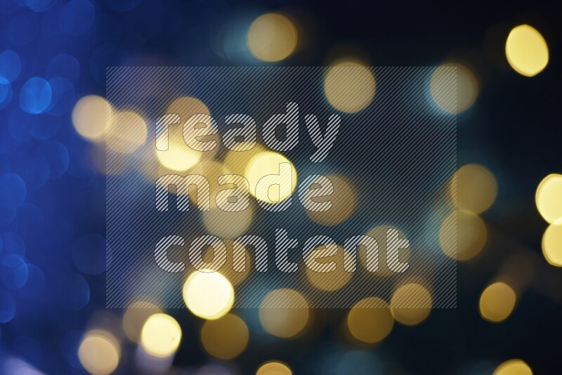 Bokeh light in yellow with blue background