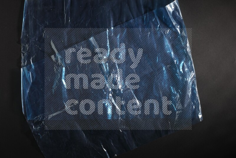 Colored plastic textures on black background