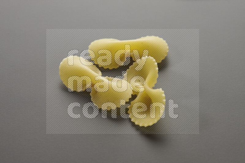 Fiocchi pasta on grey background