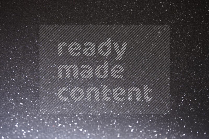 Black glittery bokeh background