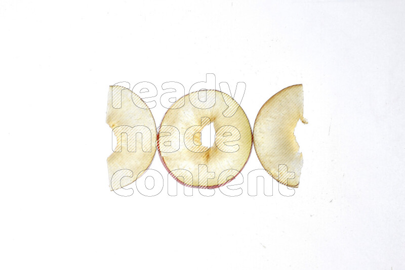 Peach slices on illuminated white background