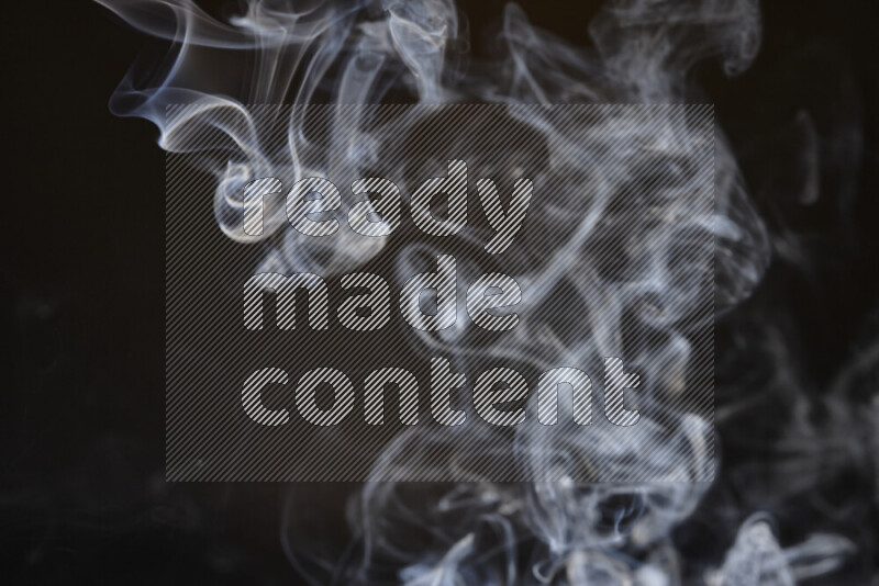 Motion of wavy smoke isolated on dark background