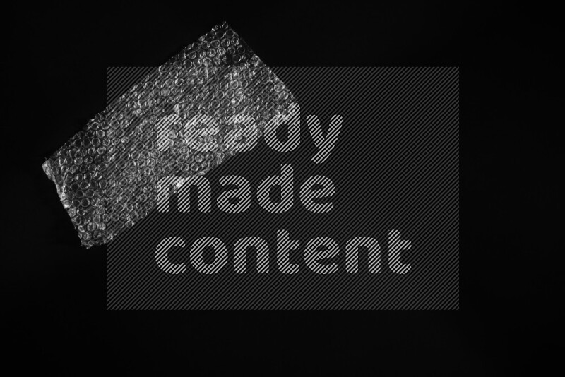 Bubble wrap texture on black background
