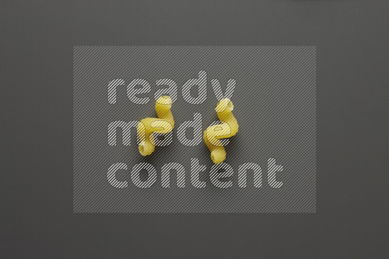 Twist pasta on grey background