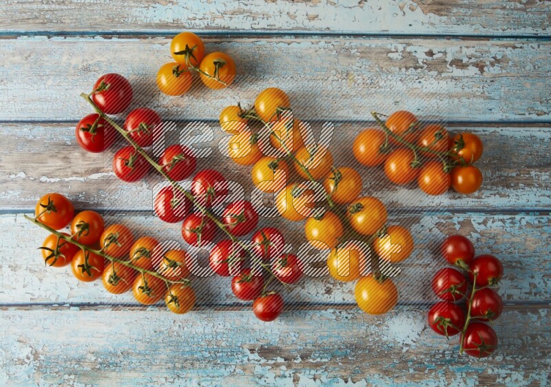 Mixed colors of cherry tomato veins topview on textured vinyl backgrounds