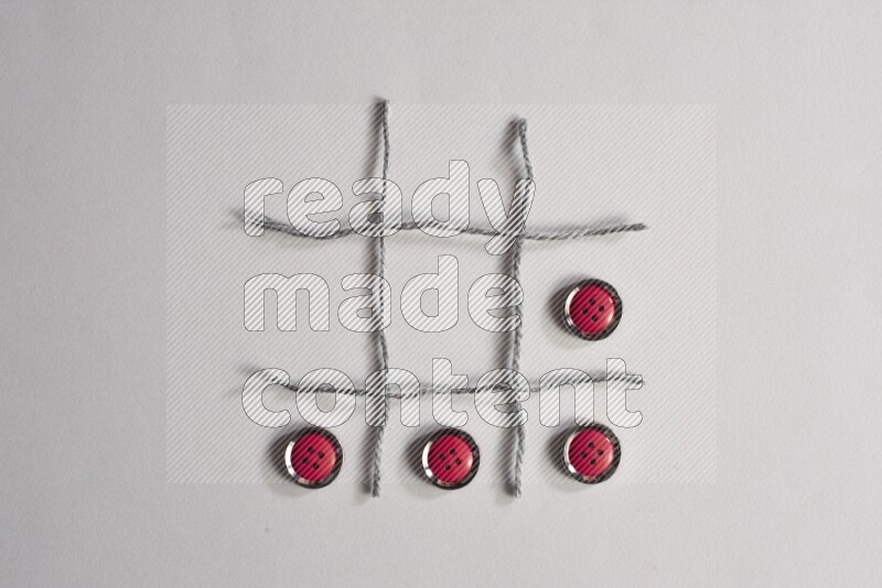 Red buttons placed on grey background