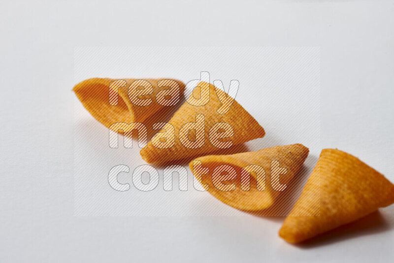 Assorted snacks on white background