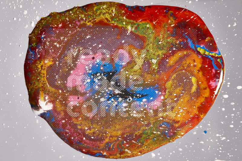 Close-ups of assorted colors blending on a grey background