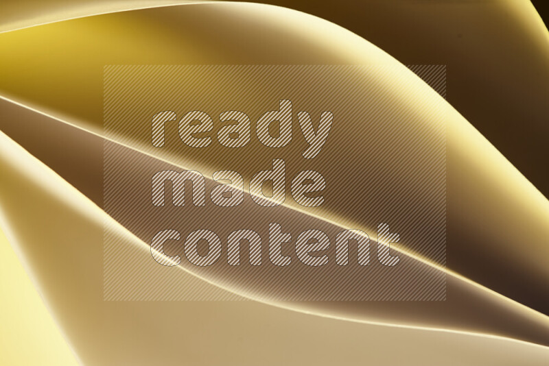 This image showcases an abstract paper art composition with paper curves in gold gradients created by colored light