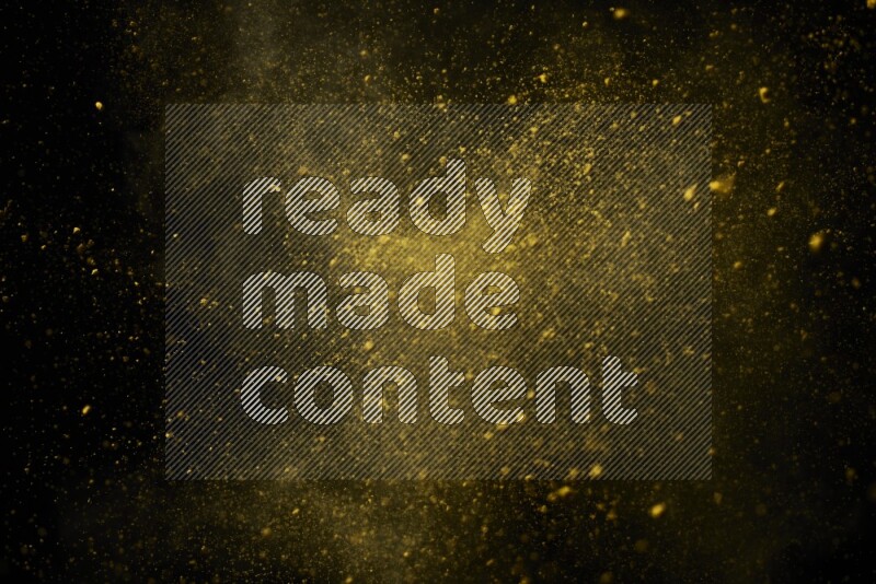 Yellow powder explosion on black background