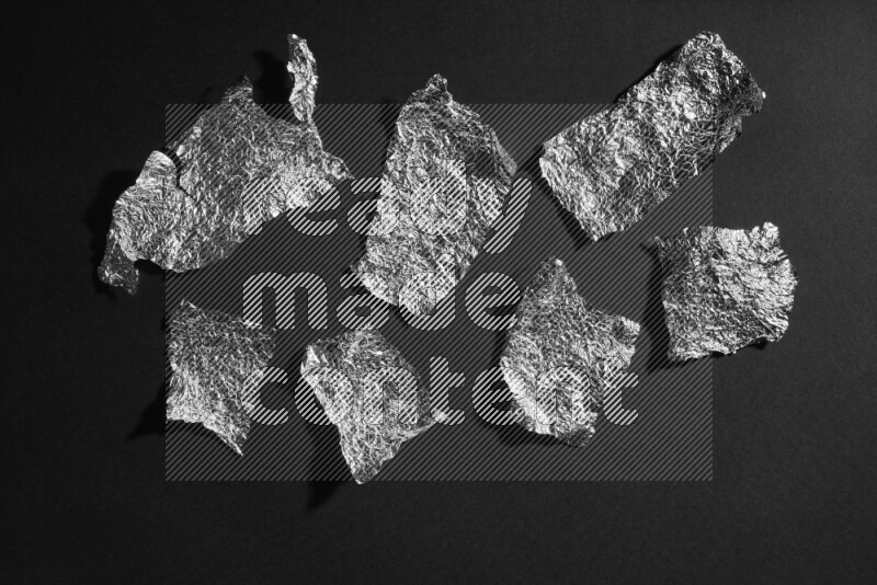 Aluminium foil on black background
