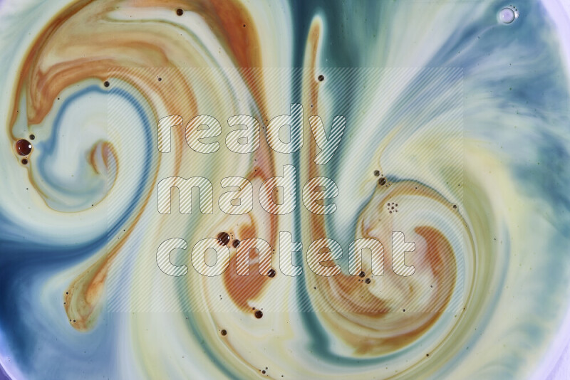 A close-up of abstract swirling patterns in green, blue and red