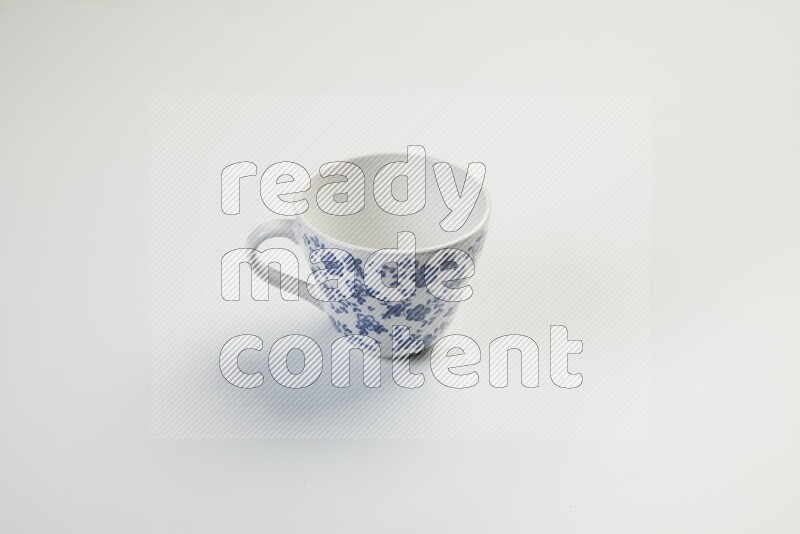white and blue mug on white background