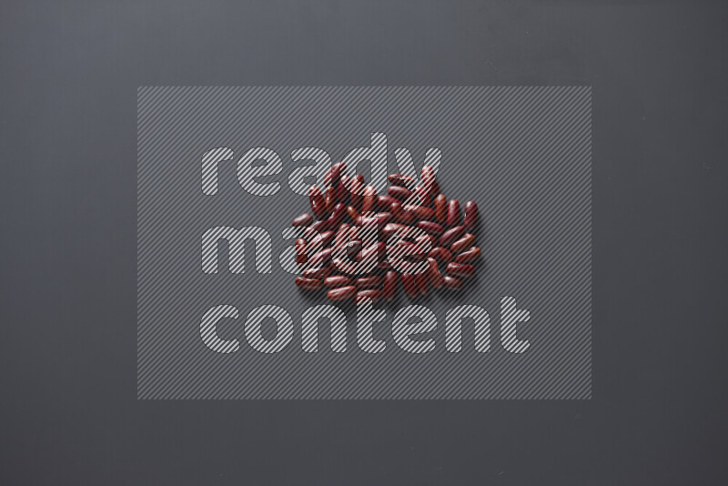 Red kidney beans on grey background